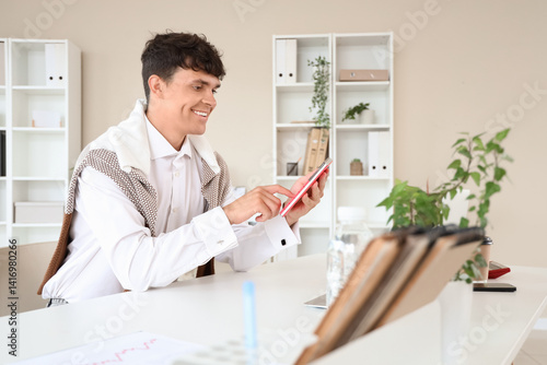 Male accountant with calcul...
