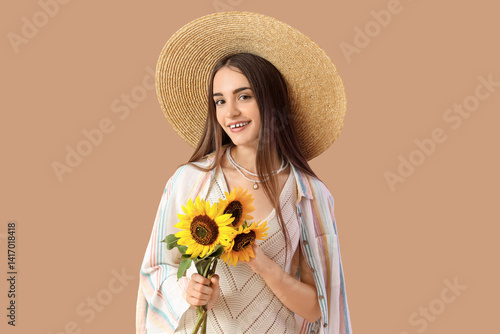 Pretty young woman with bou...