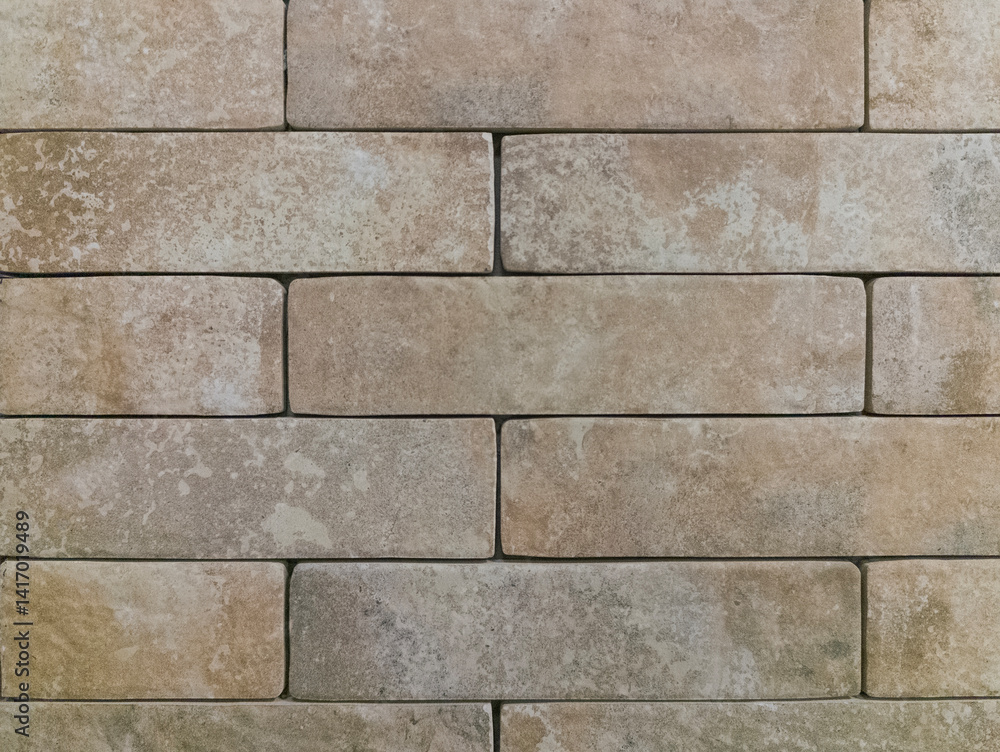Fototapeta premium The brick wall is grey. Brick background. The texture of a gray brick. Brickwork.