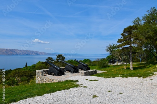 Obraz na płótnie Cannos at Nehaj fort with Velebit channel and Krk island behind inear Senj, Croatia w salonie