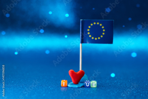 Obraz na płótnie Showing love for the European Union with playful decorations in a vibrant blue setting during a cheerful creative project w salonie
