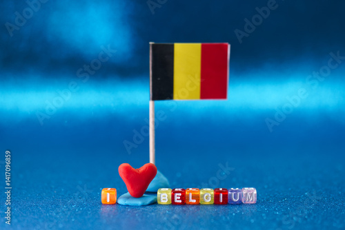 Obraz na płótnie Celebration of Belgium with flag and heart shaped symbol representing love for the country w salonie