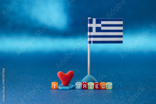 Obraz na płótnie Heart and flag display expressing love for Greece on a bright blue background w salonie
