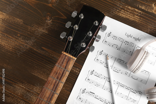 Music sheet, modern headpho...