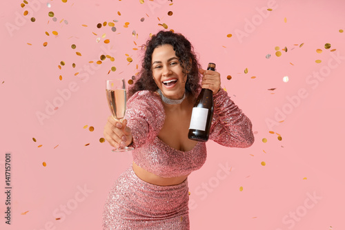 Excited young woman celebra...
