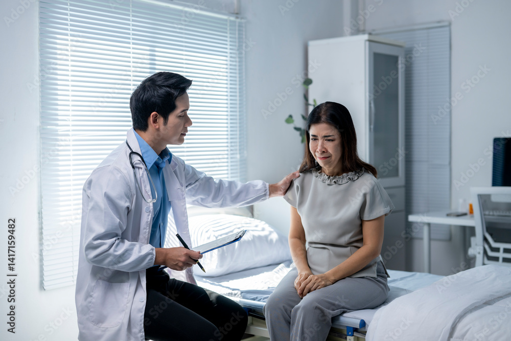 Fototapeta premium A doctor is talking to a woman in a hospital room