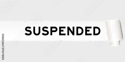 Ripped gray paper background that have word suspended under torn part