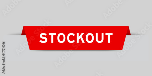 Red color inserted label with word stockout on gray background