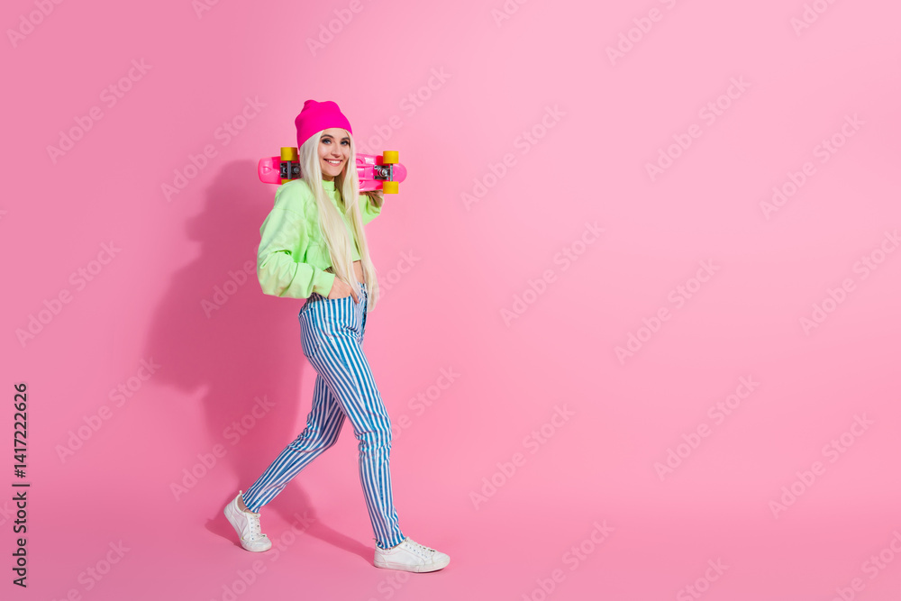 Young woman in colorful fashionable outfit with skateboard on pink background embodying trendy, stylish vibes Young woman in colorful fashionable outfit with skateboard on pink background embodying trendy, stylish vibes
