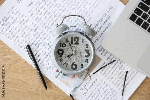 Alarm clock with newspaper,...