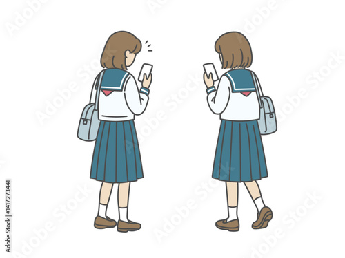 スマホを見る女子高生の後ろ姿