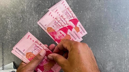 Home budgeting and cash planning for financial control. Pakistan 100 rupees currency notes