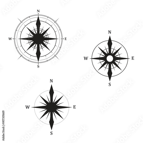compass rose with cardinal directions (N, E, S, W) and intermediate points, featuring a blue and red needle pointing north and south, symbolizing navigation and orientation.