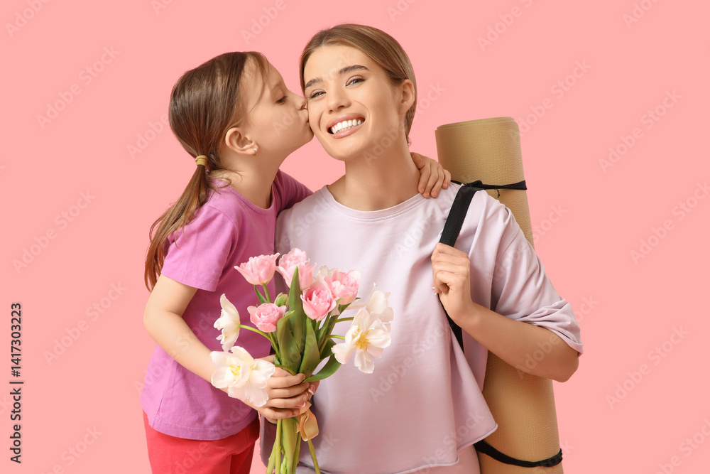 Cute little girl with bouquet of flowers greeting her sporty mother on pink background. Mother Day celebration Cute little girl with bouquet of flowers greeting her sporty mother on pink background. Mother Day celebration