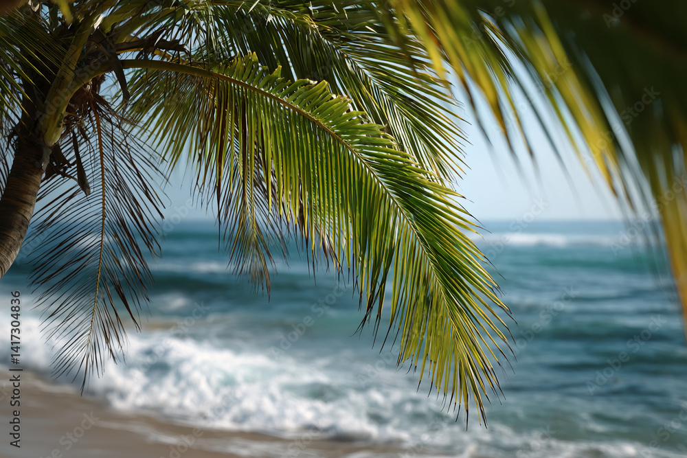 Fototapeta premium Close-up of green palm frond against blurred ocean background, suggesting tropical vacation, relaxation, and escape