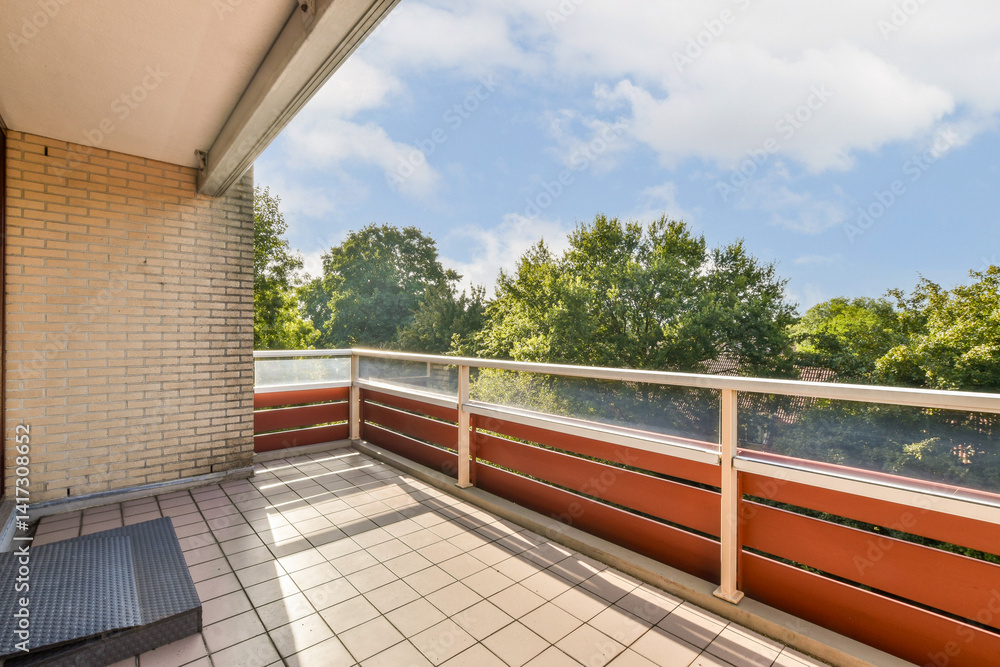 A stylish balcony features a spacious area with tiled flooring surrounded by lush green trees under a bright sky, creating a tranquil outdoor space. A stylish balcony features a spacious area with tiled flooring surrounded by lush green trees under a bright sky, creating a tranquil outdoor space.