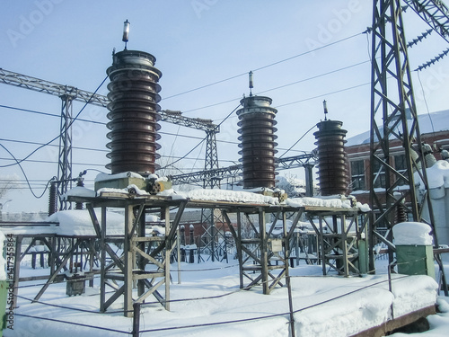 Power plant equipment for industrial energy distribution. High voltage substation insulator. Electricity infrastructure, transmission facilities, high power electrical supply