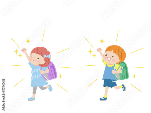 ランドセルを背負ってガッツポーズする子供