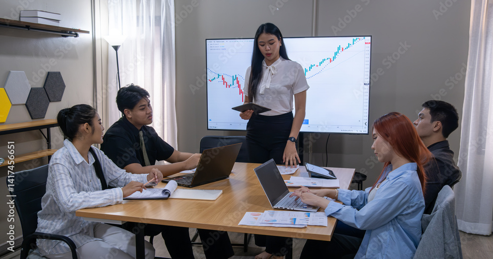 Business team discussing market analysis in a modern conference room Business team discussing market analysis in a modern conference room