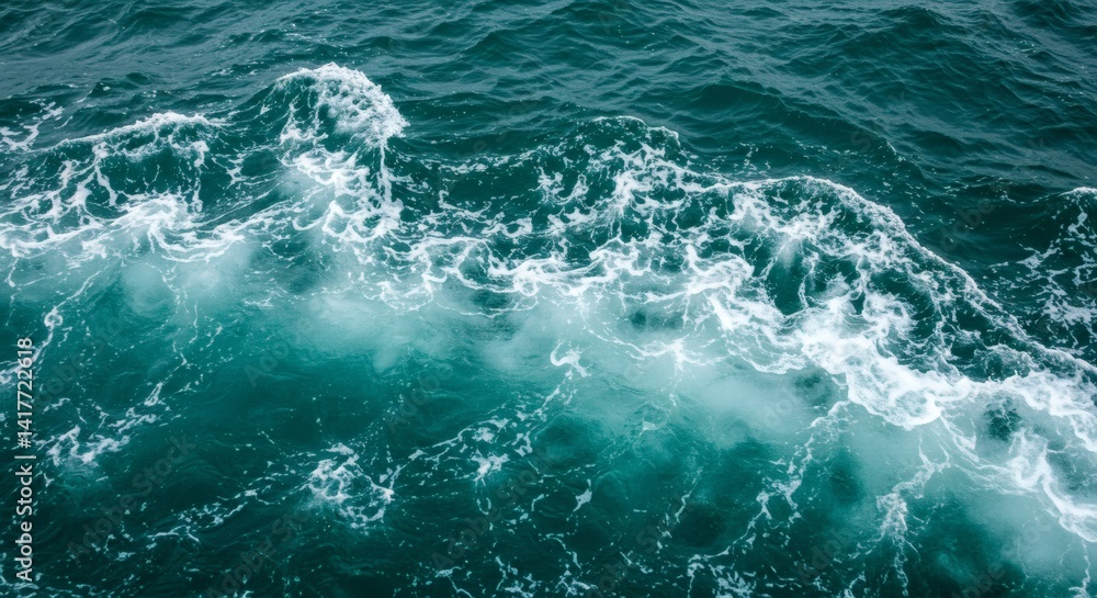 Fototapeta premium Ocean Wave Crashing with Foam Creating Texture and Sea Movement