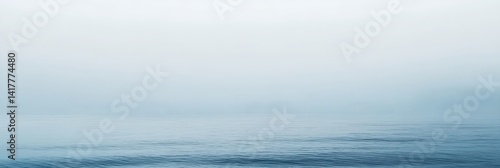 Obraz na płótnie A foggy day with a calm ocean w salonie