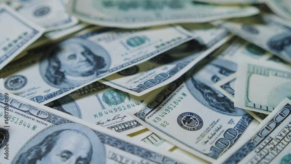 A Beautiful Slow Motion Close-Up of U.S. One Hundred Dollar Bills. The Footage Highlights the Features and Details of the Bills, Perfect for Money, Banking, and Economic Projects. A Beautiful Slow Motion Close-Up of U.S. One Hundred Dollar Bills. The Footage Highlights the Features and Details of the Bills, Perfect for Money, Banking, and Economic Projects.