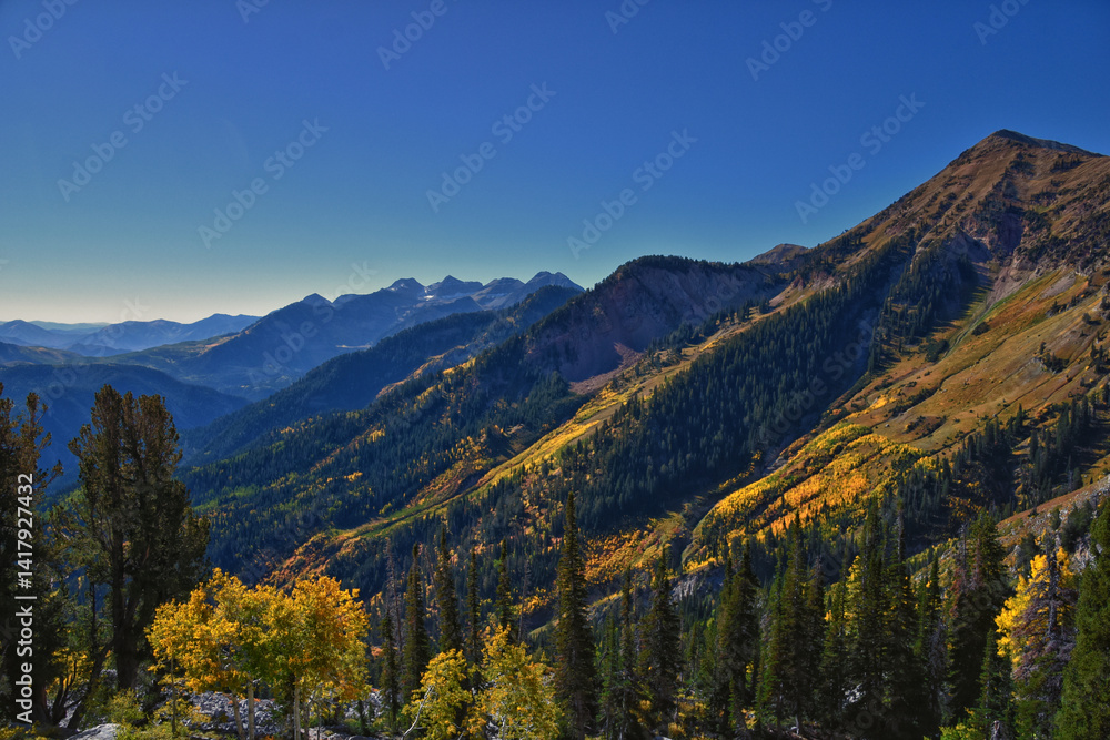 Box Elder Peak hiking views from trail, American Fork Canyon. Lone Peak, Mt Timpanogos, Wasatch Range Rocky Mountains, Utah, United States.