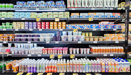Latvia, Riga, April, 15, 2025 - Delicious and healthy bio dairy products on shelf of supermarket. Natural products without milk fat substitute. Food quality concept.