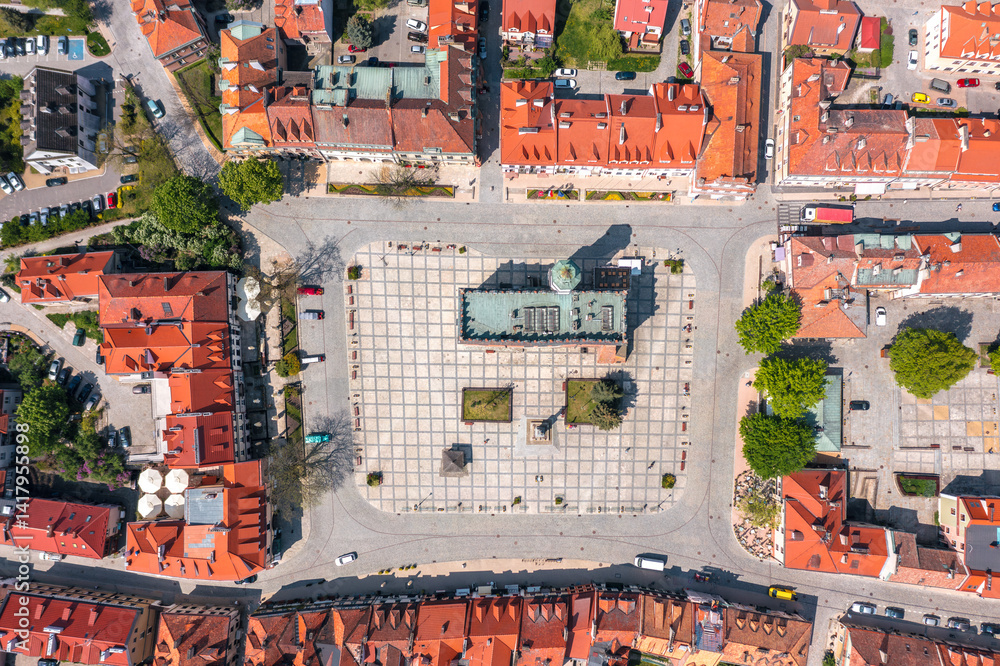 Summer cityscape of Sandomierz, Świętokrzyskie, Poland. Aerial view directly above the Town Hall and Old Market square