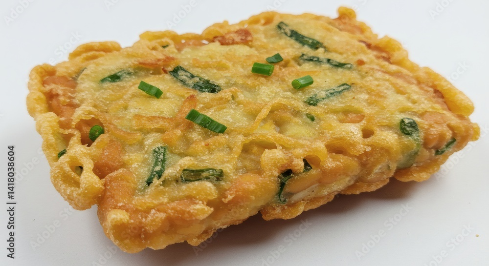 Tempe Mendoan (indonesian fried tempeh) isolated on white background Tempe Mendoan (indonesian fried tempeh) isolated on white background