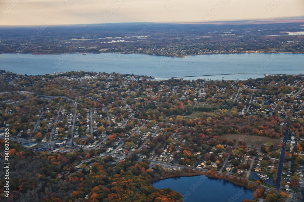 Providence, Rhode Island, fall at sunset from Airplane, Aerial, Downtown USA city skyline on the Providence River.
