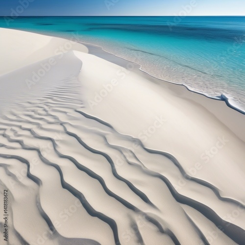 A picturesque beach with soft, white sand, surrounded by azure waters and bathed in sunlight.
