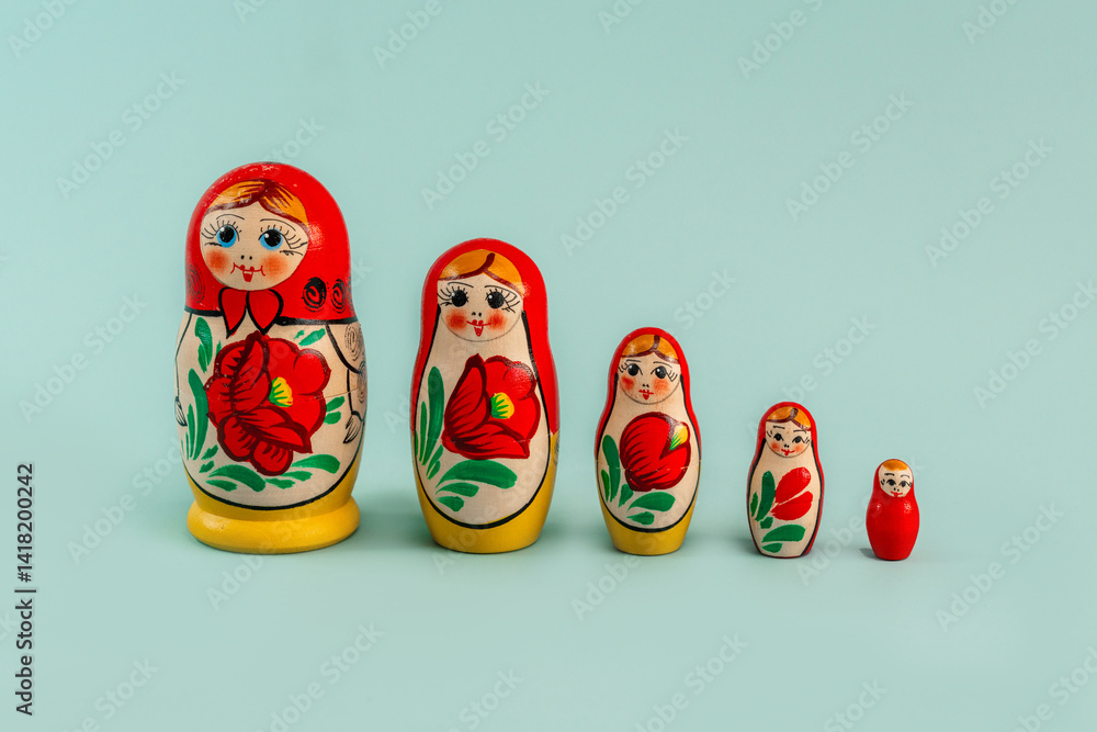Matryoshka dolls on a blue background. Russian Matryoshka dolls (Babushka). Saint Petersburg, Russia - 14 Apr 2025 Matryoshka dolls on a blue background. Russian Matryoshka dolls (Babushka). Saint Petersburg, Russia - 14 Apr 2025