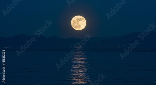Obraz na płótnie Serene Full Moon Over Coastal Mountains - Tranquil ocean scene, full moon rising, mountains silhouetted, peaceful night, nature's beauty. Symbolizing serenity, mystery, wonder, peace, and hope w salonie