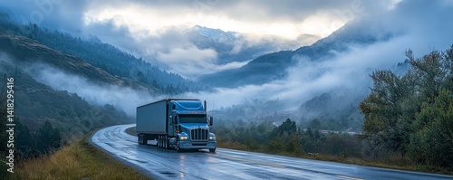 panoramic - truck driving through the mountains on a cloudy day