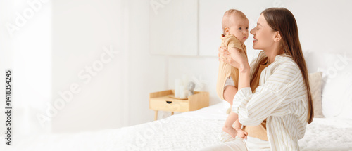 Happy mother with her littl...