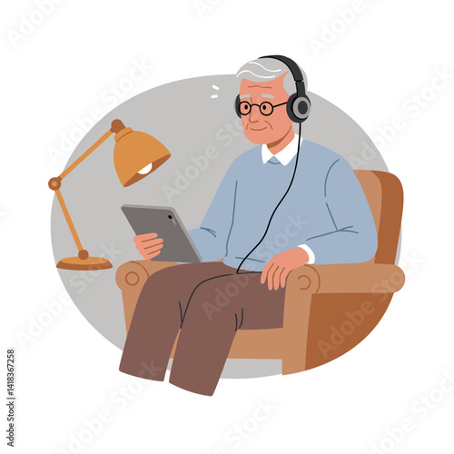 Elderly man using a tablet and listening to music in a cozy armchair with headphones