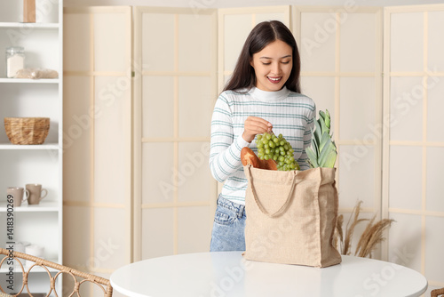 Young Asian woman with eco ...