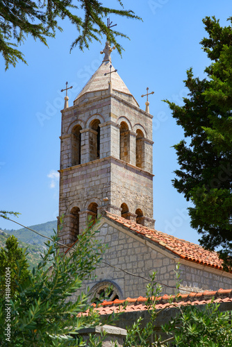 Obraz na płótnie Reževići Monastery in Montenegro - Church of the Dormition of the Mother of God of the Serbian orthodox church near Budva and the Adriatic Sea w salonie