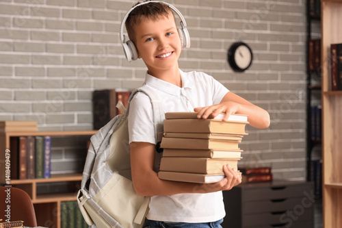 Teenage boy in headphones w...