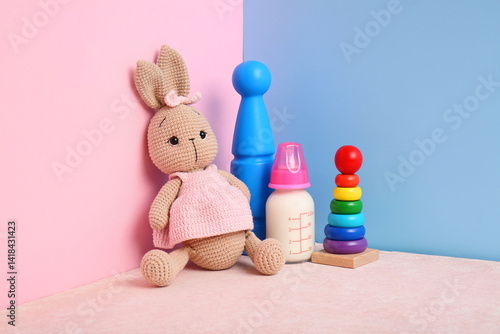 Set of toys and bottle of m...