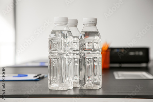 Bottles of water on table i...