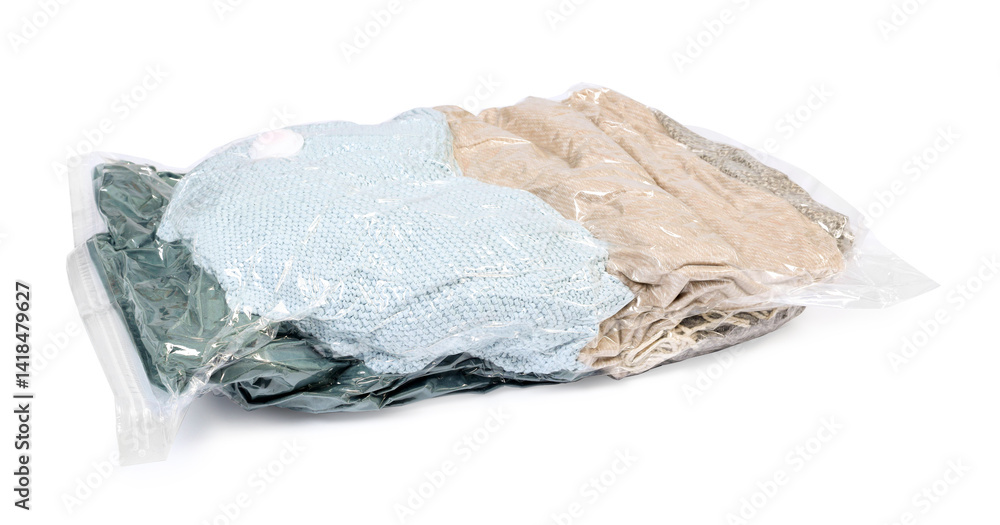 Compressed vacuum bag with clothes isolated on white