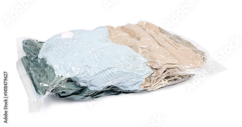 Obraz na płótnie Compressed vacuum bag with clothes isolated on white w salonie