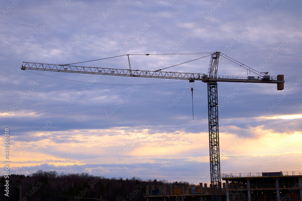 Construction Crane Industrial Silhouette Golden Hour Cloudy sky Construction Crane Industrial Silhouette Golden Hour Cloudy sky