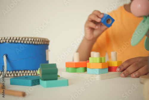 Fotografi Colorful wooden toys encourage creative play in a bright setting