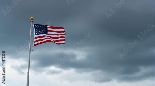 american flag on storm sky