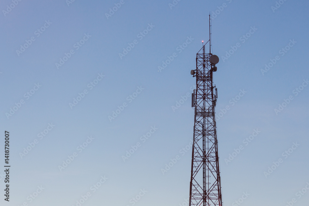 Telecommunication tower urban setting infrastructure image clear sky environment elevated viewpoint connectivity concept Telecommunication tower urban setting infrastructure image clear sky environment elevated viewpoint connectivity concept