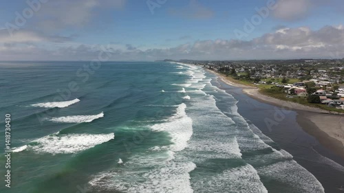 Drone Following Waves Along Waihi Beach Coastline, Bay of Plenty New Zealand
