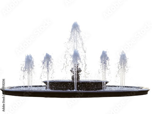 Nighttime Elegance: A Stunning Water Fountain Display with Multiple Jets against a Dark Background
